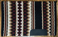 Patterned rug with geometric design on a wooden floor